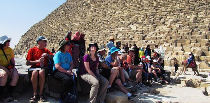 4-group-sitting-on-foot-of-the-great-pyramid